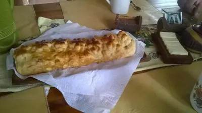 a piece of food sitting on top of a table at Cabañas Quisama in Nono