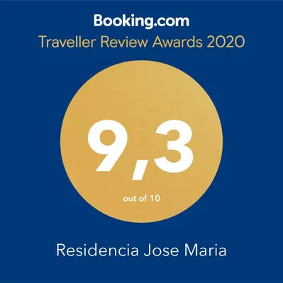 a yellow circle with the number nine and the text travelling review awards at Residencia Jose Maria in Santa Rosa de Calamuchita