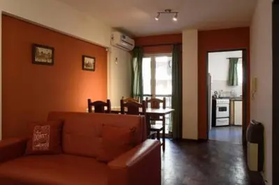 a living room with a couch and a table at Apartamento Pueyrredón in Cordoba