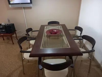 a glass table with a bowl on top of it at Departamento sobre principal calle PEATONAL plena zona Finaciera y Comercial in Cordoba