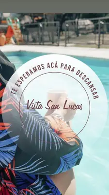 a picture of a person in a swimming pool at Apart Hotel Vista San Lucas in Carpintería