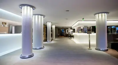a row of white columns in a building at Windsor Hotel in Cordoba