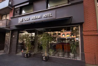 a store front with a sign that reads west usama korean hotel at Casa Urbana Hotel in Cordoba