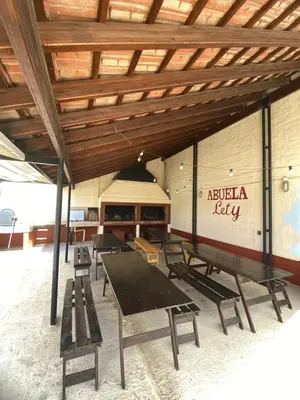 a group of ping pong tables in a room at Complejo Abuela Lety in Merlo