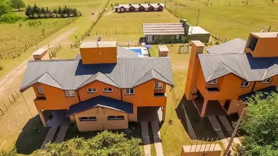 an overhead view of a house with orange at Posta Los Reartes in Los Reartes