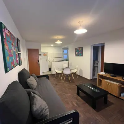 a living room with a couch and a table at Edificio Torre Agora in Cordoba