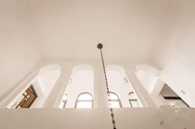 a chandelier hanging from the ceiling of a building at Virreinato Hotel Boutique in Cordoba