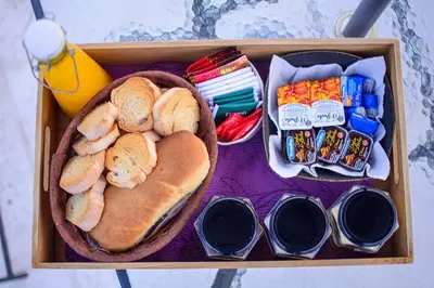 a lunch box with hot dogs and chips and snacks at El Zuriaco in Santa Rosa de Calamuchita