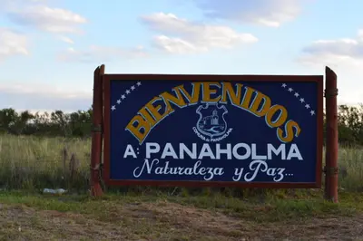 a sign for a pantomimosa sign in a field at Cabañas Los Álamos Panaholma in Panaholma