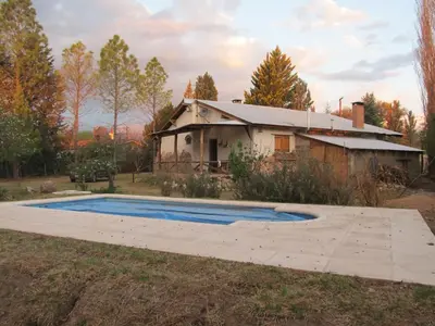 a house with a swimming pool in the yard at Luna Azul in Nono