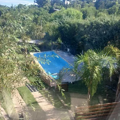 an overhead view of a swimming pool in a garden at Terralagum in Villa Parque Siquiman