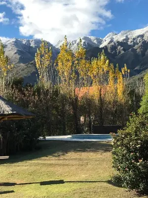 a view of a yard with mountains in the background at Zolara Di Merlo in Merlo