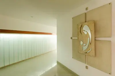 a room with a door with a symbol on it at Apartamento Obispo Trejo IV by Lofty in Cordoba