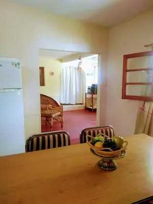 a bowl of fruit on a table in a kitchen at El Chaparral Villa Dolores Traslasierra 2 in Piedra Pintada