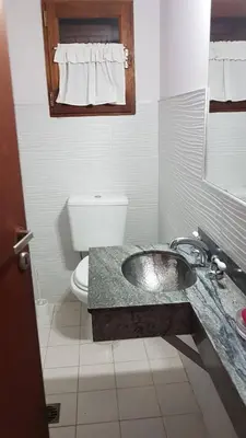 a bathroom with a sink and a toilet at Chalet Nuevo Amanecer in Merlo