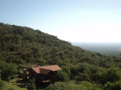 a small cabin on the side of a hill at Cabañas Toay Merlo San Luis in Merlo