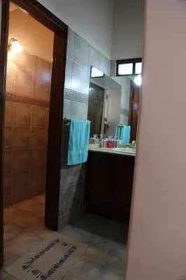 a bathroom with a sink and a mirror at Espectacular casa in Cordoba