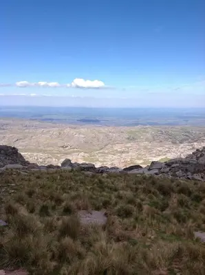 a view of the desert from the top of a mountain at Cabañas Vientos del Sur in Villa Yacanto