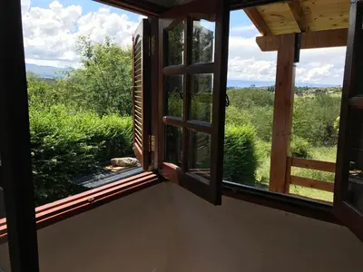 a view from the window of a house at cabaña La Retama in Villa Yacanto