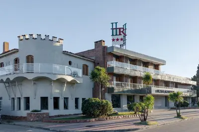 a building with a tower on top of it at Riviera Hotel & Spa in Villa Carlos Paz