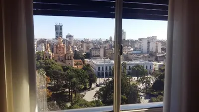 a view of a city from a window at Hotel Sussex in Cordoba