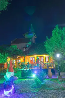 a playground in front of a house at night at Lauquen Pilmaiquen y spa in Merlo
