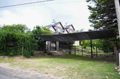 a black cover in front of a house at Cabañas Alma de Pueblo, Mayu Sumaj in San Antonio de Arredondo