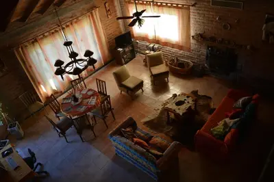 an overhead view of a living room with a ceiling fan at Atahualpa mi Posada in Mina Clavero