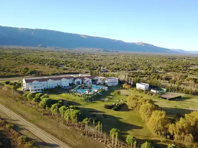 an aerial view of a resort in the middle of a field at Howard Johnson Resort Spa & Convention Center in Merlo