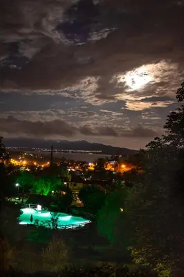 a view of a city at night at Capilla del Lago in Villa Carlos Paz