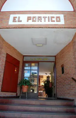 a building with a sign that reads el portal at Apart Hotel El Portico in Villa Carlos Paz