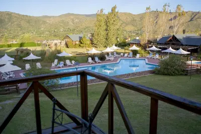 a view of a pool at a resort at Chamonix Posada & Spa in Villa General Belgrano