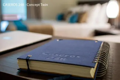 a book sitting on top of a table at Caseros 248 Hotel in Cordoba