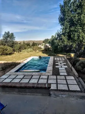 a swimming pool in the middle of a yard at Hermosa casa en Potrero de Garay in Potrero de Garay