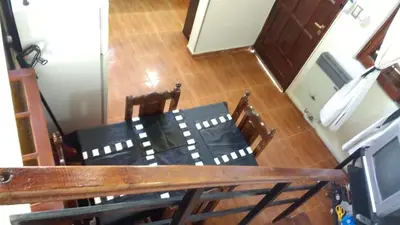 an overhead view of a dining room table and chairs at Cabañas El Descanso in Villa Carlos Paz