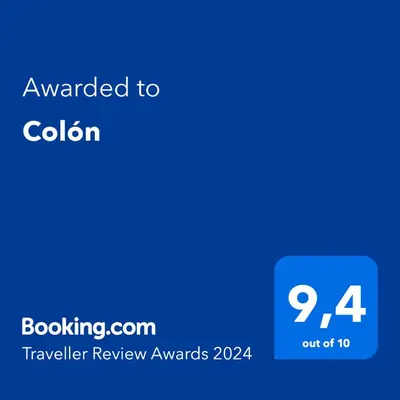 a blue text box with the words awarded to colion at Colón in Cordoba