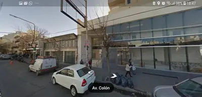a white car parked in front of a building at Colón in Cordoba