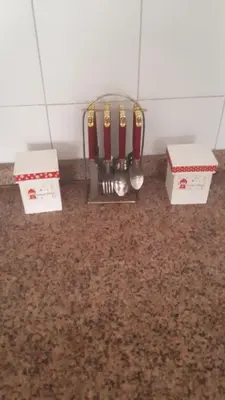 a kitchen counter with two boxes and two spoons at mi depto en cba in Cordoba