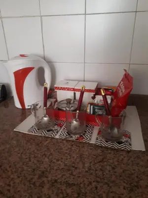 a kitchen counter with some utensils on a counter top at mi depto en cba in Cordoba