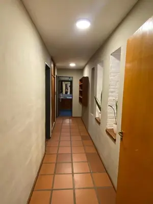 a corridor of a hallway with a hallway at Casa en Córdoba Zona Norte in Cordoba