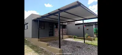 a house with awning on the side of it at Waylla in Panaholma
