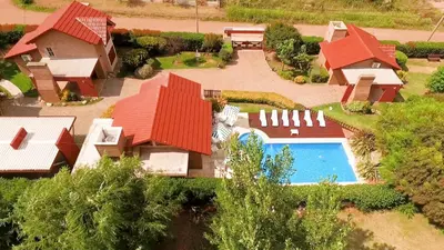 an aerial view of a house with a swimming pool at Cabañas Las Pircas in Villa del Dique