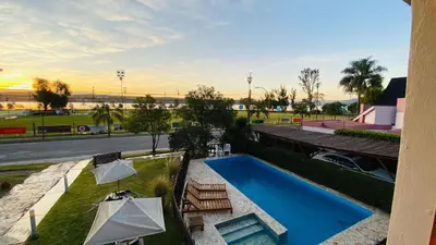 an overhead view of a swimming pool in a building at Madeo Hotel & Spa in Villa Carlos Paz