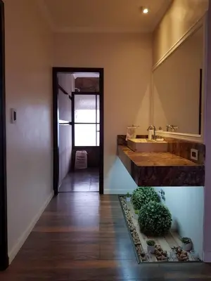 a bathroom with a sink and a mirror at MIracampo in San Antonio de Arredondo