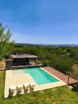 an overhead view of a swimming pool and a picnic table at MIracampo in San Antonio de Arredondo
