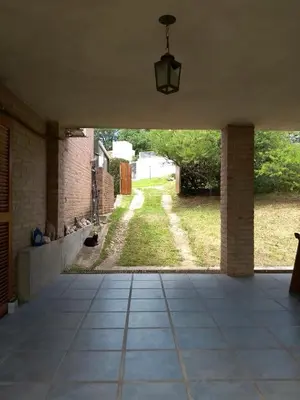 an empty patio with a view of a yard at Casa en Barrio Costa Azul in Villa Carlos Paz