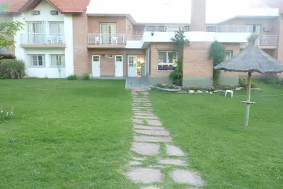 a walkway in the yard of a house at Hotel Terrazas del Rincon in Merlo