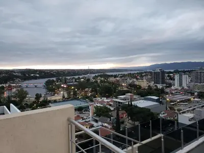 a view of a city from a balcony at Torre del Lago I in Villa Carlos Paz