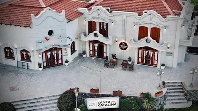 an aerial view of a large white building at Hotel Santa Catalina in Río Cuarto