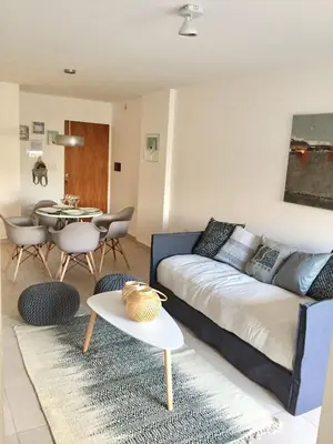a living room with a couch and a table at 370 General Simón Bolívar in Cordoba